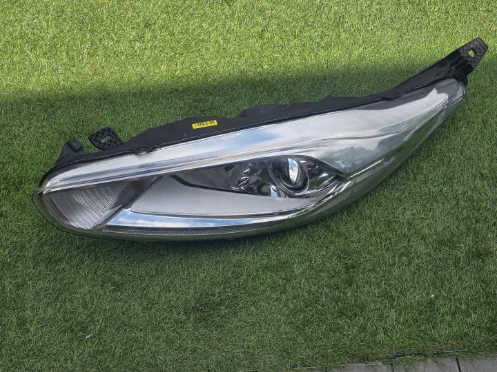 Frontscheinwerfer Ford Fiesta I C1BB13W030CG 1090041 Links Headlight SCH7833559231pn