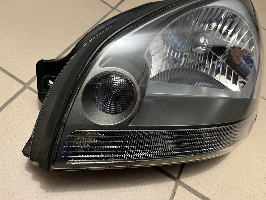 Frontscheinwerfer Hyundai Tucson Links Scheinwerfer Headlight