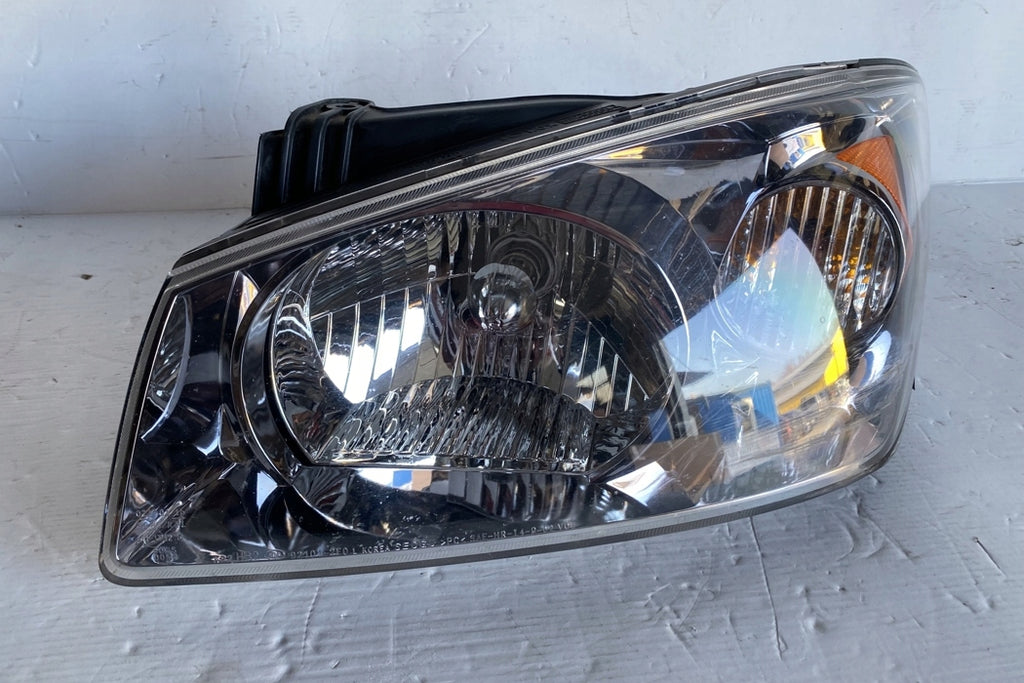 Frontscheinwerfer Kia Cerato 921012F0 Links Scheinwerfer Headlight