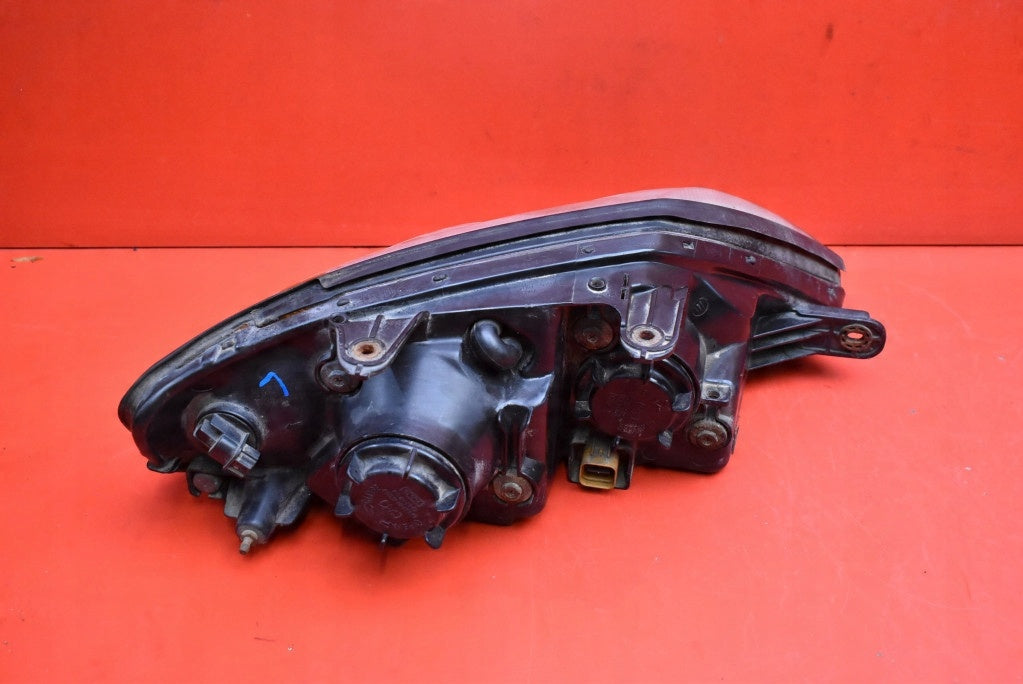 Frontscheinwerfer Hyundai Coupe 921012CXXX Links Scheinwerfer Headlight
