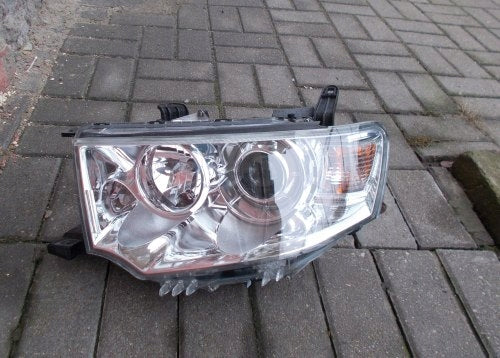 Frontscheinwerfer Mitsubishi Pajero Sport 8301A877 Links Scheinwerfer Headlight