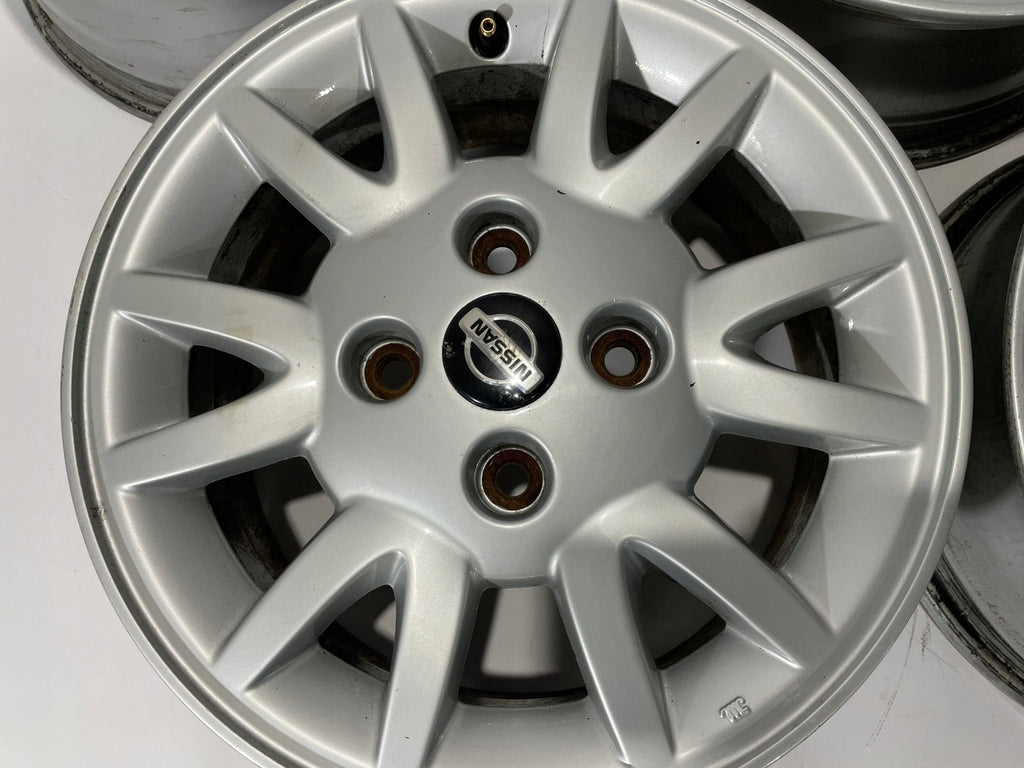 4x Alufelge 15 Zoll 6.0" 4x114.3 45ET Glanz Silber Nissan Primera P11 Almera