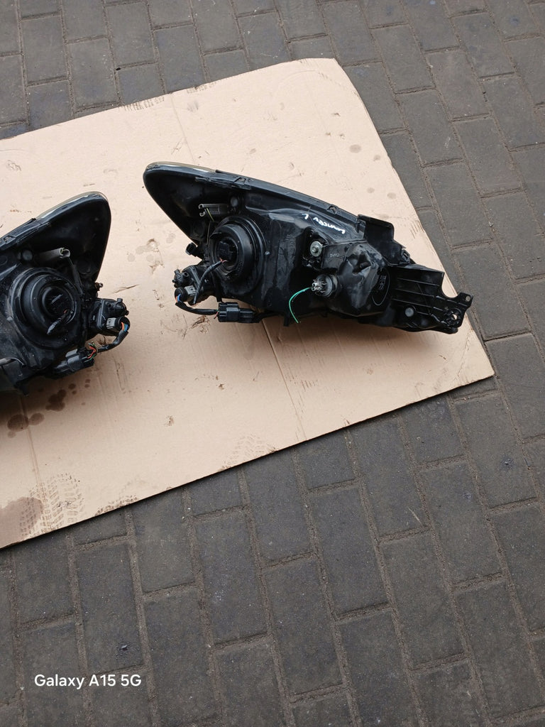 Frontscheinwerfer Mitsubishi Lancer VII I Ein Satz Scheinwerfer Headlight SCH7761310468ga