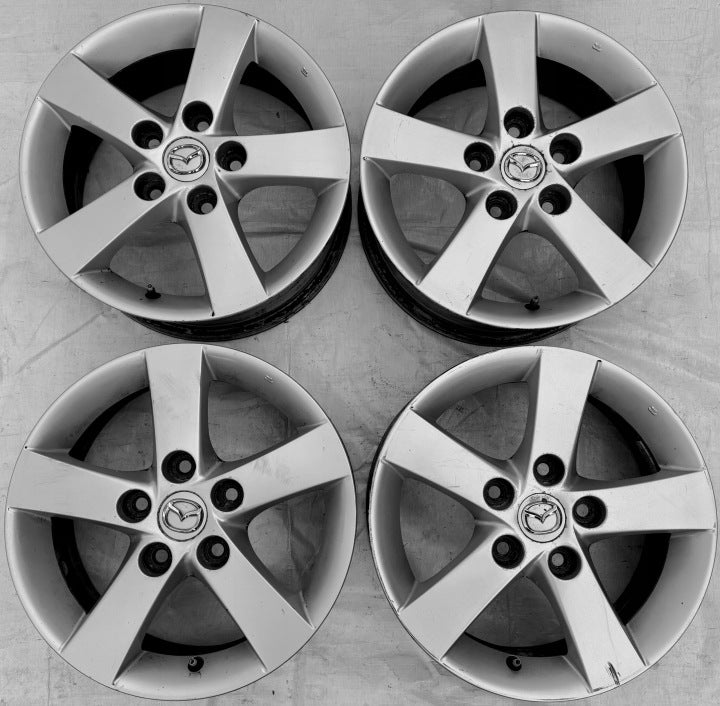 4x Alufelge 15 Zoll 6.0" 5x114.3 52 5ET Silber Mazda I Rim Wheel FEL1253561721mc