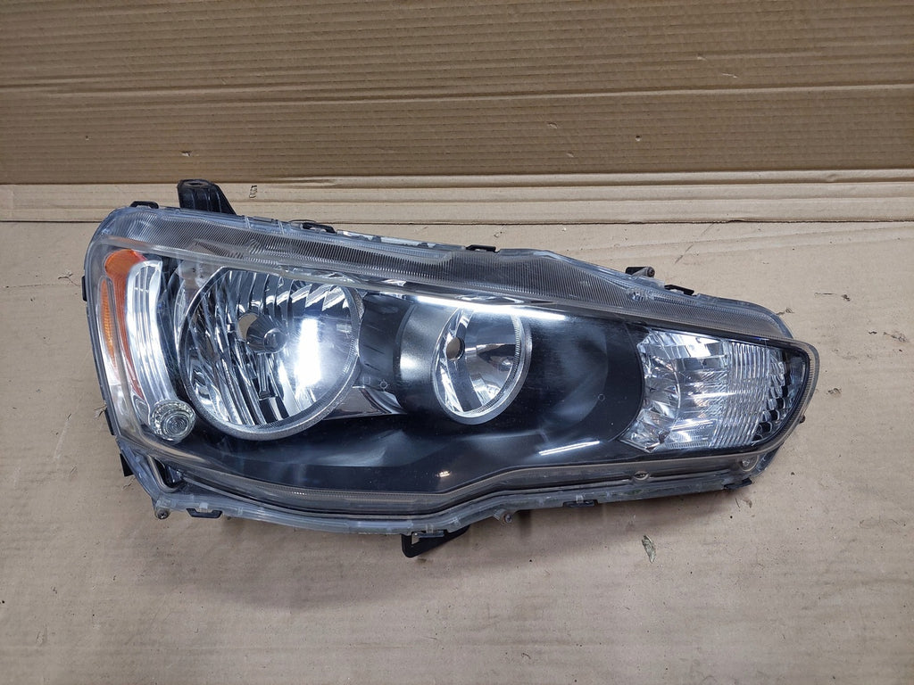 Frontscheinwerfer Mitsubishi Outlander II Ein Stück (Rechts oder Links)