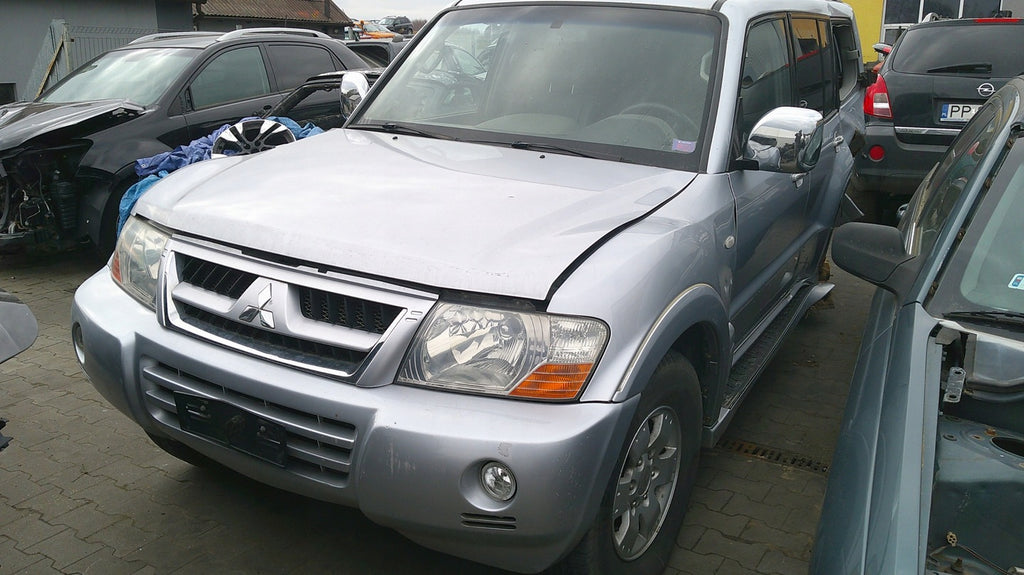 Frontscheinwerfer Mitsubishi Pajero III OE222333 Ein Stück (Rechts oder Links)