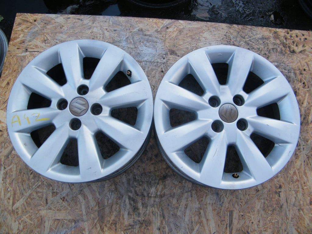 1x Alufelge 15 Zoll 6.0" 4x100 45ET Glanz Silber DH6019 Suzuki Baleno Swift I FEL6556825782dv