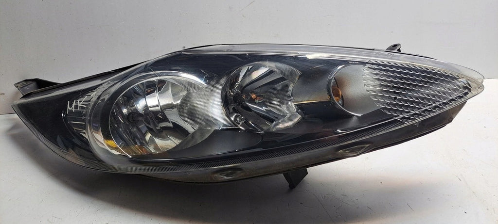 Frontscheinwerfer Ford Fiesta I 8A61-13W029-AH FALSE Scheinwerfer Headlight SCH8788680130ev