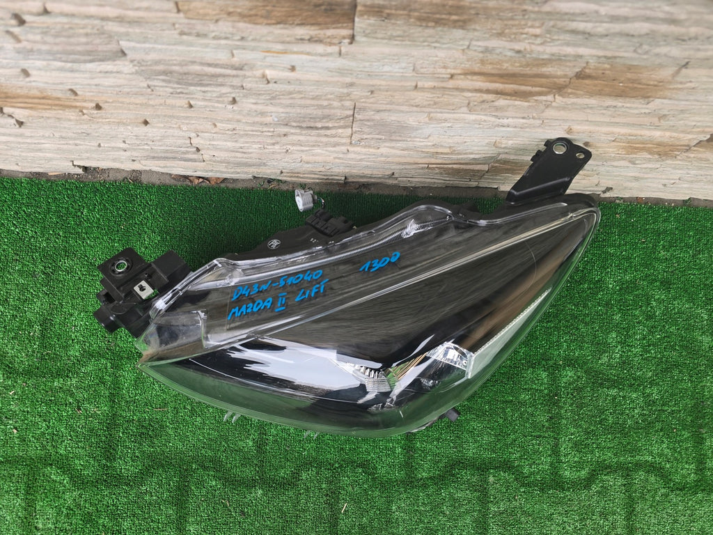 Frontscheinwerfer Mazda D43N-51040 Links Scheinwerfer Headlight