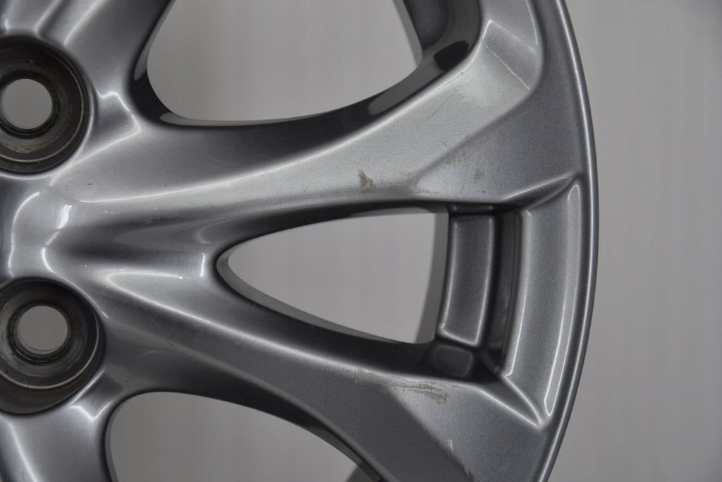 1x Alufelge 15 Zoll 5.5" 4x100 40ET Glanz Graphit 9965465550 Mazda Rim Wheel FEL9829022627vs