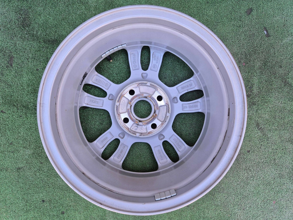 1x Alufelge 15 Zoll 4x108 E1BJ1007AA Ford Fiesta I Rim Wheel FEL6022733393dy