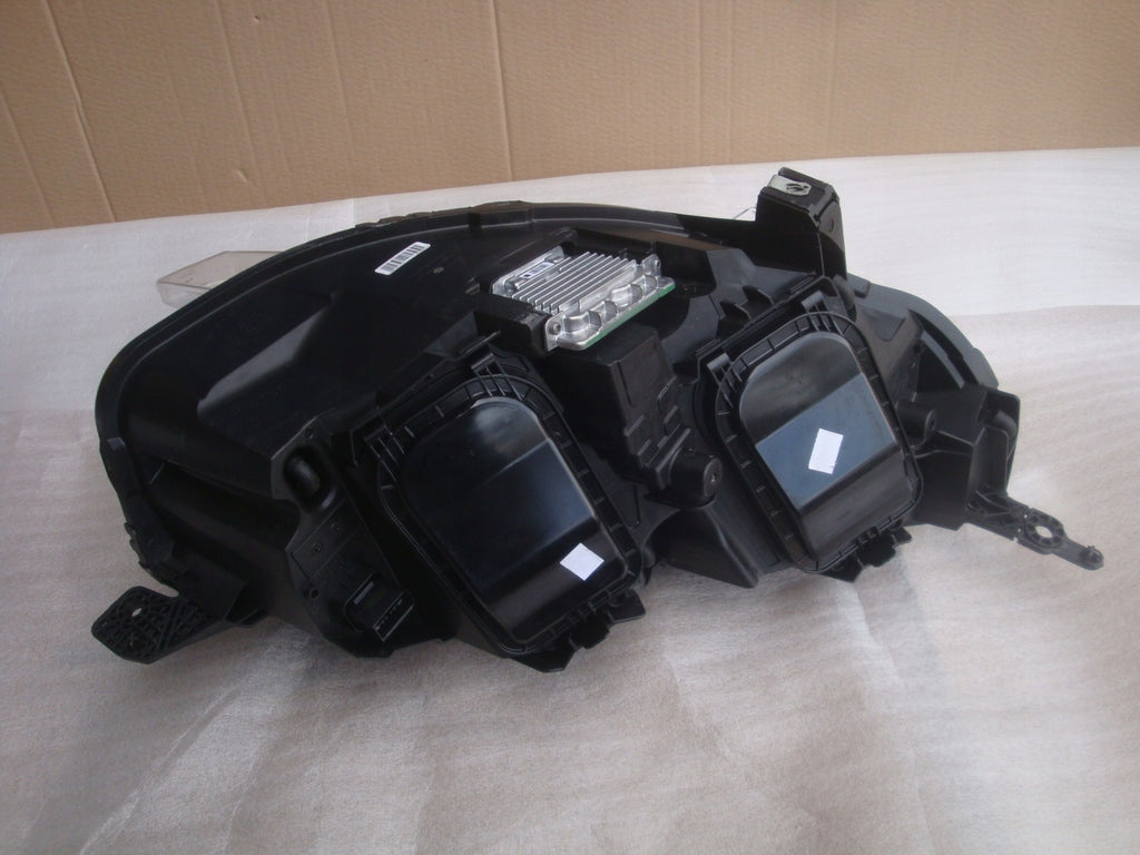 Frontscheinwerfer Opel Zafira 00218274-01 Xenon Links Scheinwerfer Headlight