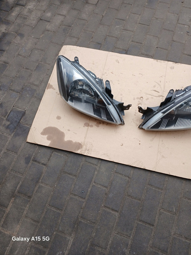 Frontscheinwerfer Mitsubishi Lancer VII I Ein Satz Scheinwerfer Headlight SCH7761310468ga