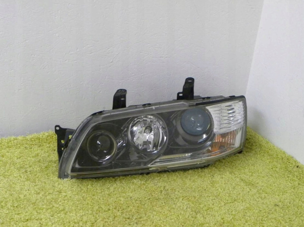 Frontscheinwerfer Mitsubishi Lancer Links Scheinwerfer Headlight SCH4547454401tl