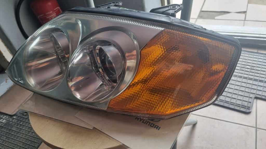 Frontscheinwerfer Hyundai II Coupe Links Scheinwerfer Headlight