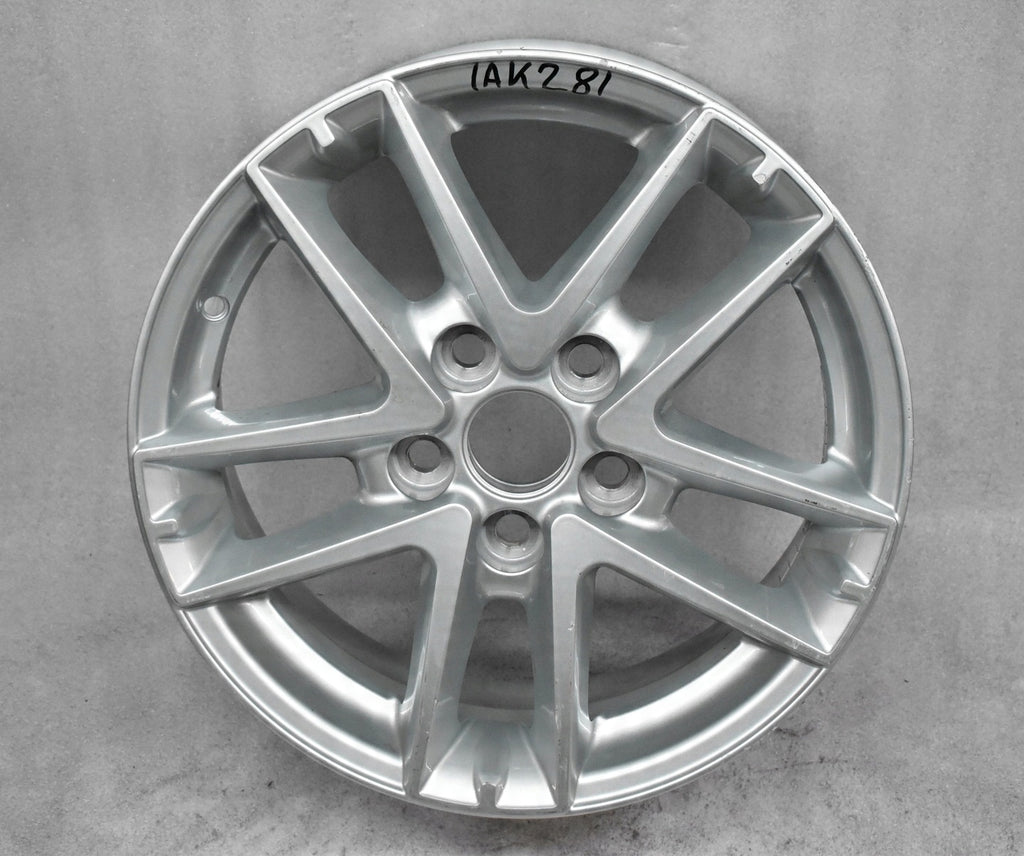 1x Alufelge 16 Zoll 6.5" 5x114.3 45ET Glanz Silber 42611YY500 Mg Corolla