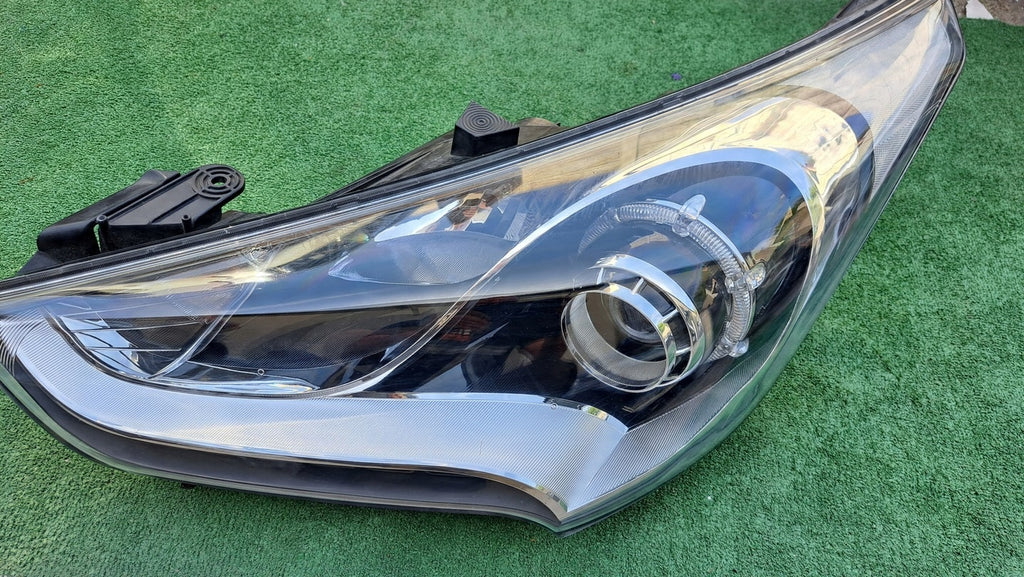 Frontscheinwerfer Hyundai Veloster 92101-2V160 Links Scheinwerfer Headlight