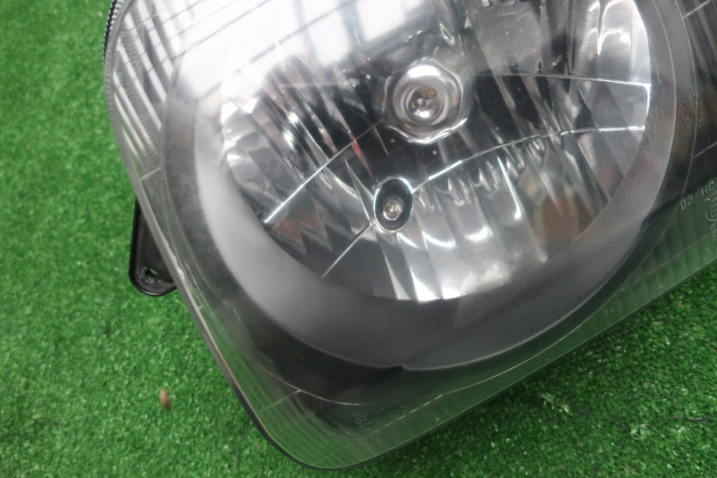 Frontscheinwerfer Suzuki Jimny 35100-82A30 Links Scheinwerfer Headlight