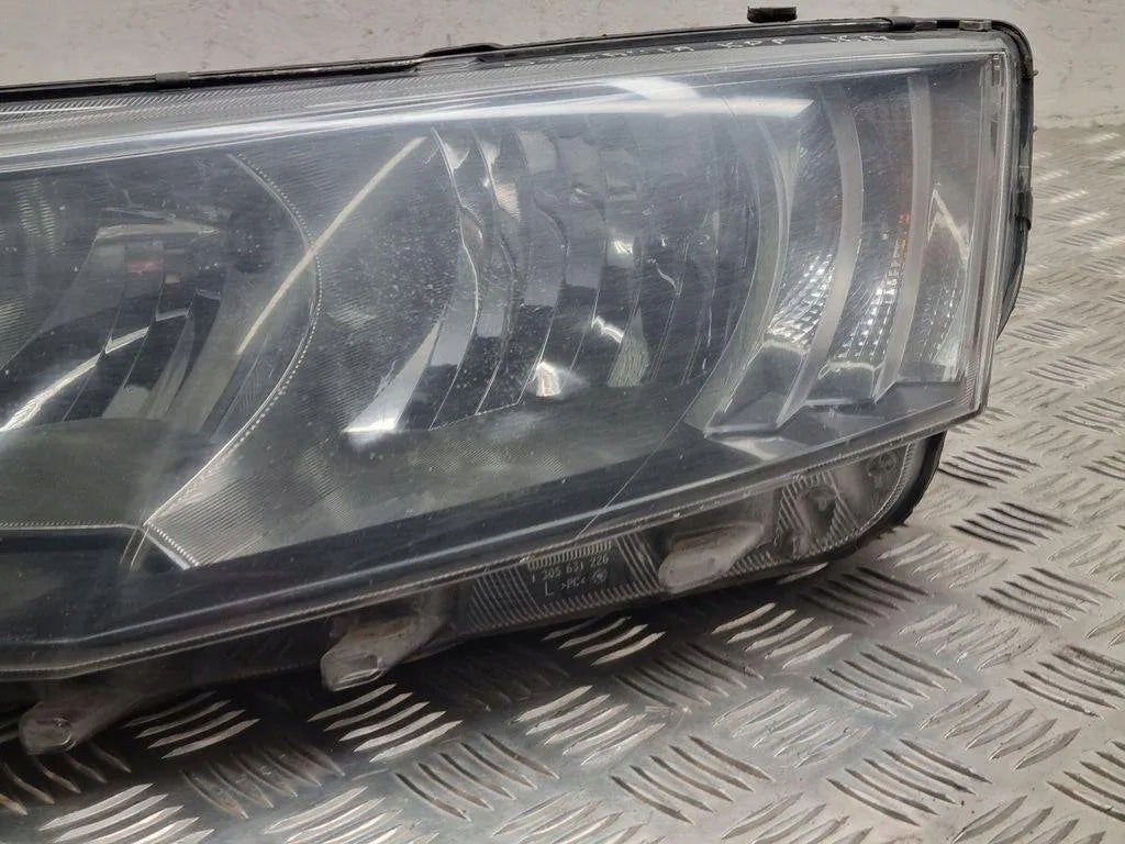 Frontscheinwerfer Skoda Octavia I 5E1941015 Links Scheinwerfer Headlight SCH5589142367xr
