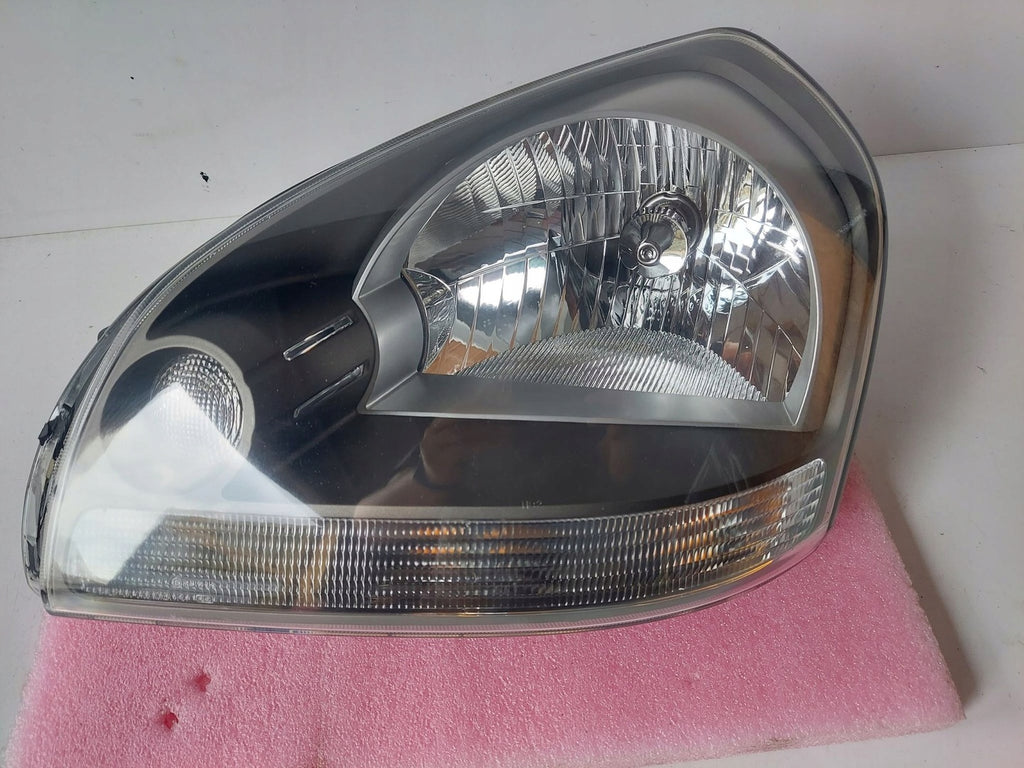 Frontscheinwerfer Hyundai Tucson 92101-2EXXX Links Scheinwerfer Headlight