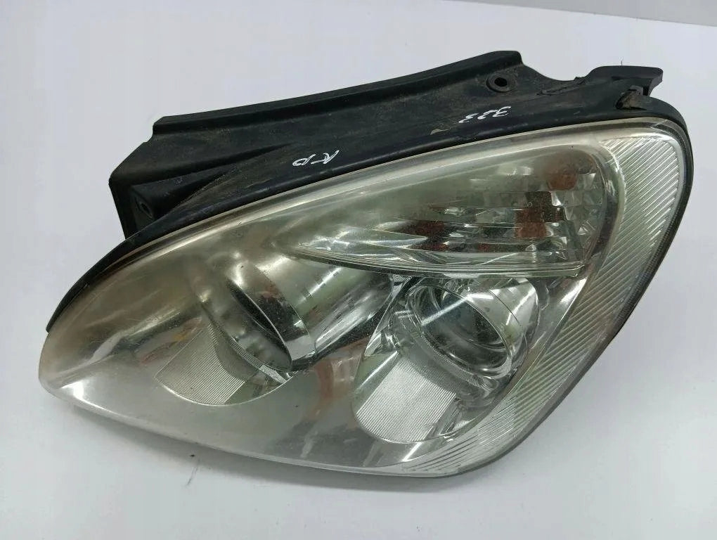 Frontscheinwerfer Kia Carens II A044936 Links Scheinwerfer Headlight SCH8732063063ah