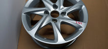 Load image into Gallery viewer, 1x Alufelge 15 Zoll 6.0" 4x108 23ET Glanz Silber 9673773577 Peugeot 208 FEL5812710565eg