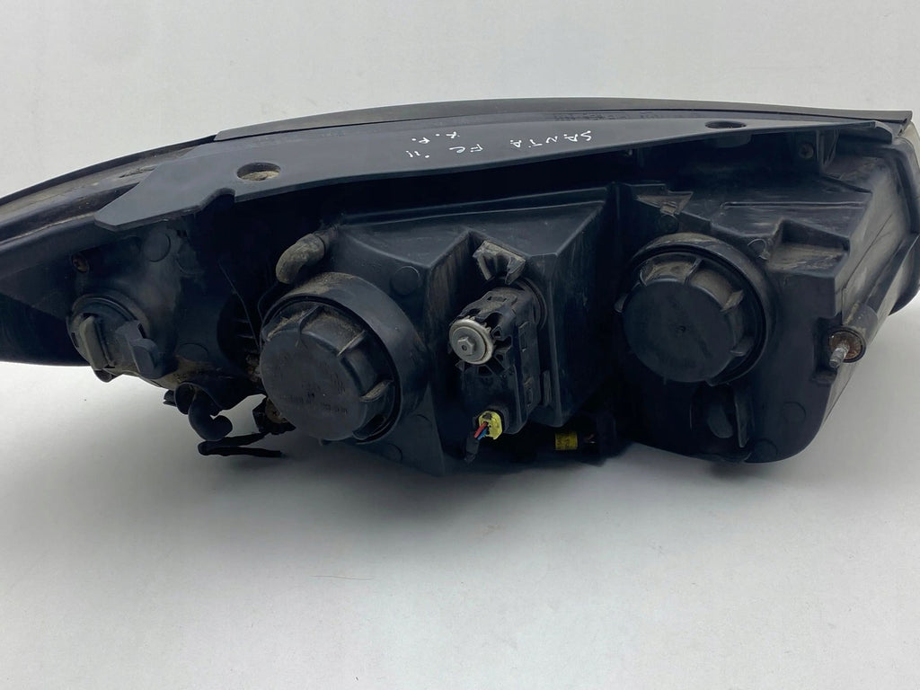 Frontscheinwerfer Hyundai Santa I Fe 921012B025 Links Scheinwerfer Headlight SCH5806191584ka