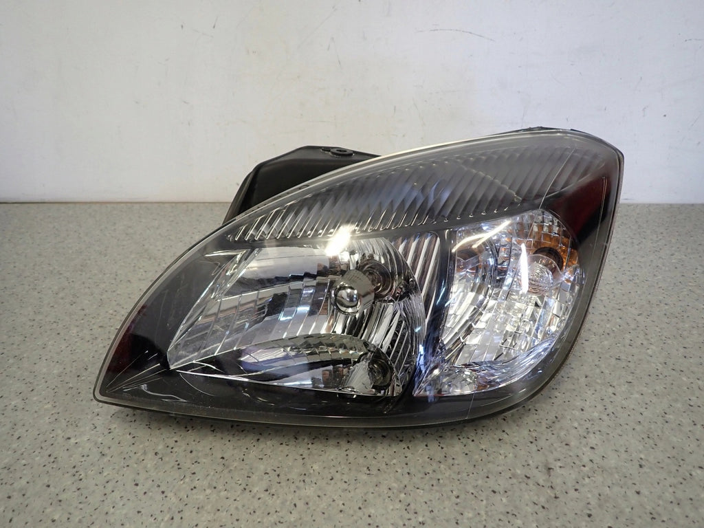 Frontscheinwerfer Kia Rio II Links Scheinwerfer Headlight SCH5605317179li