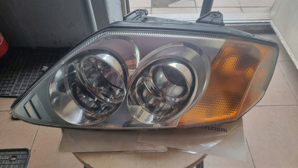 Frontscheinwerfer Hyundai II Coupe Links Scheinwerfer Headlight