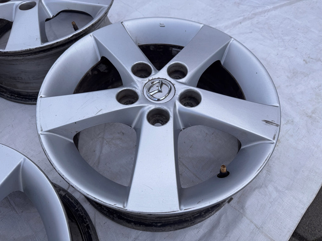 4x Alufelge 15 Zoll 6.0" 5x114.3 52 5ET Silber Mazda I Rim Wheel FEL1253561721mc
