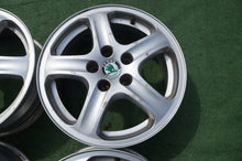 Load image into Gallery viewer, 4x Alufelge 15 Zoll 6.0" 5x100 38ET Glanz Silber 1U0601025 Skoda Octavia I Fabia FEL2665990004ux
