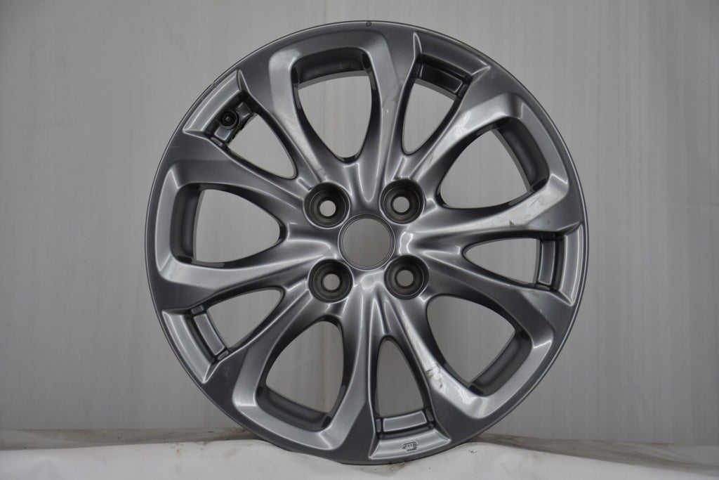 1x Alufelge 15 Zoll 5.5" 4x100 40ET Glanz Graphit 9965465550 Mazda Rim Wheel FEL9829022627vs
