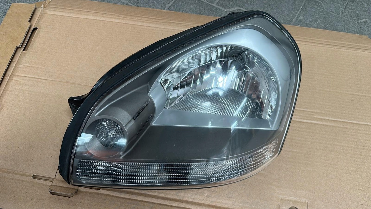 Frontscheinwerfer Hyundai Tucson Links Scheinwerfer Headlight SCH6321174770fh