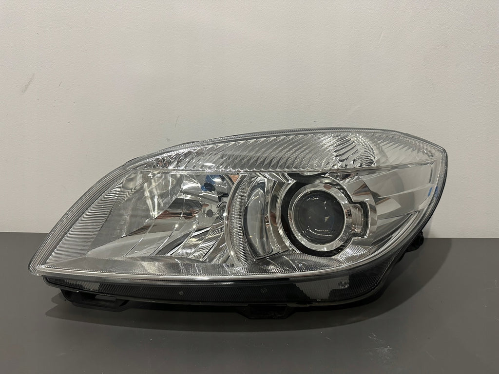 Frontscheinwerfer Skoda Fabia II 5J1941015E Links Scheinwerfer Headlight