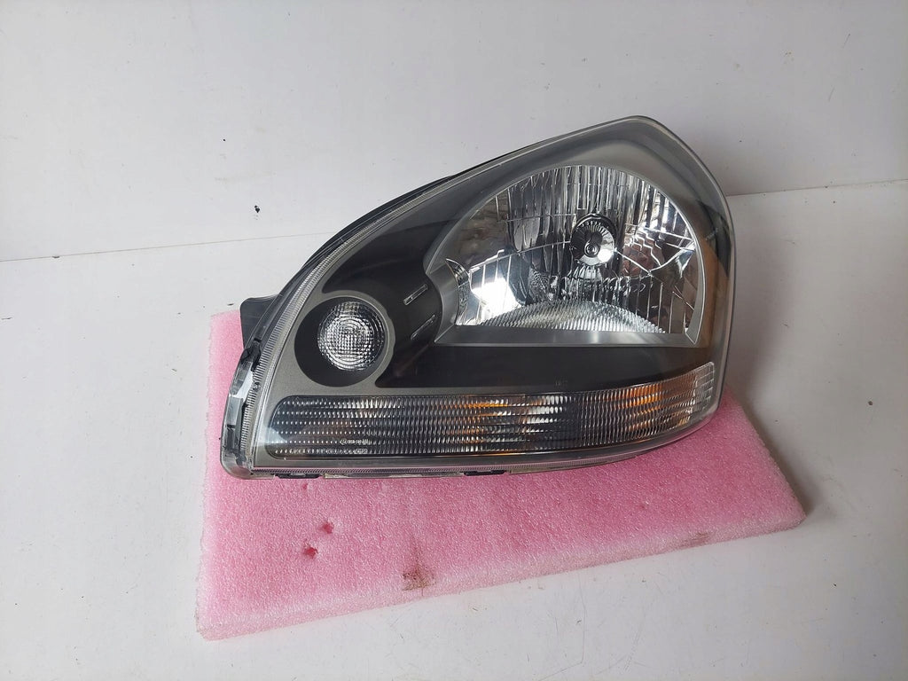 Frontscheinwerfer Hyundai Tucson 92101-2EXXX Links Scheinwerfer Headlight