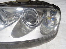Laden Sie das Bild in den Galerie-Viewer, Frontscheinwerfer VW Touareg 7L6941015BK 89307851 Xenon Links Headlight