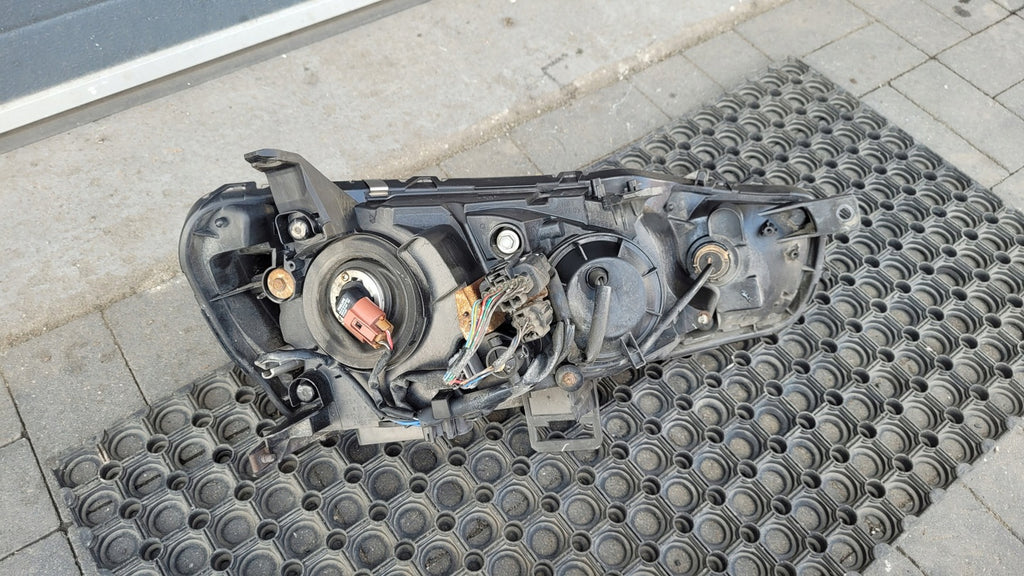 Frontscheinwerfer Mitsubishi Lancer VIII P8597 Links Scheinwerfer Headlight