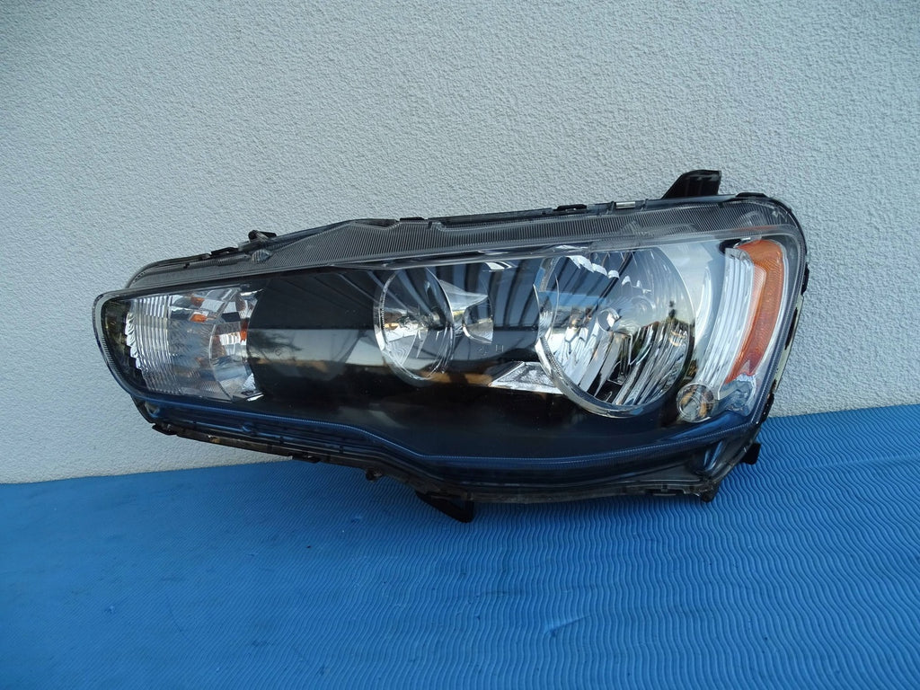 Frontscheinwerfer Mitsubishi Lancer I 8301C339 0510160155 Rechts oder Links