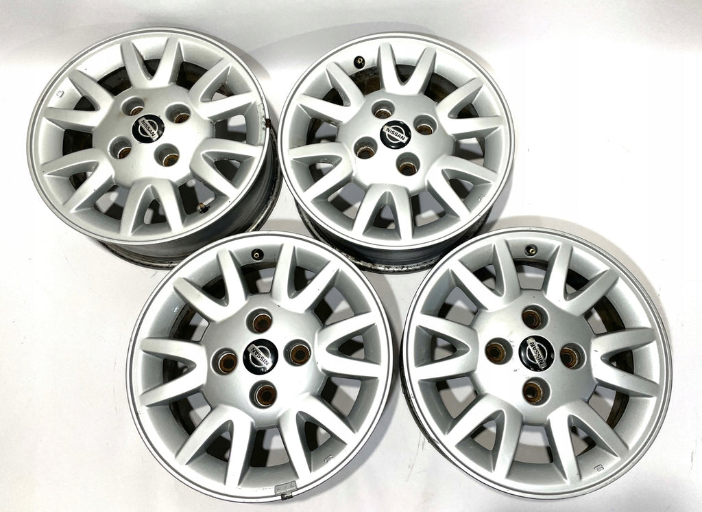 4x Alufelge 15 Zoll 6.0" 4x114.3 45ET Glanz Silber Nissan Primera P11 Almera