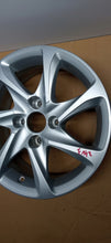 Load image into Gallery viewer, 1x Alufelge 15 Zoll 6.0" 4x108 23ET Glanz Silber 9673773577 Peugeot 208 FEL5812710565eg
