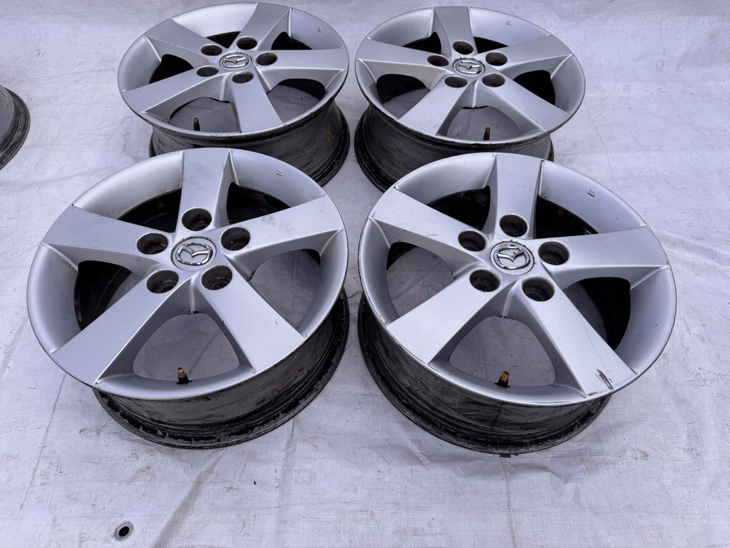 4x Alufelge 15 Zoll 6.0" 5x114.3 52 5ET Silber Mazda I Rim Wheel FEL1253561721mc