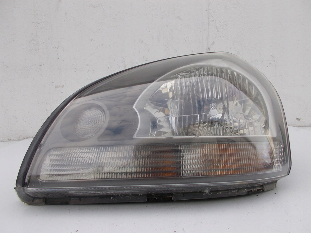 Frontscheinwerfer Hyundai Tucson 92101-2EXXX Links Scheinwerfer Headlight