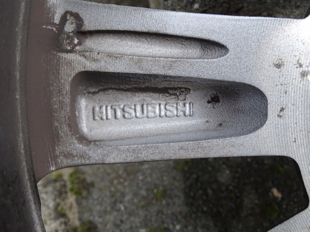 1x Alufelge 15 Zoll 5.0" 4x100 46ET 9KTO422443525 Mitsubishi Space Star