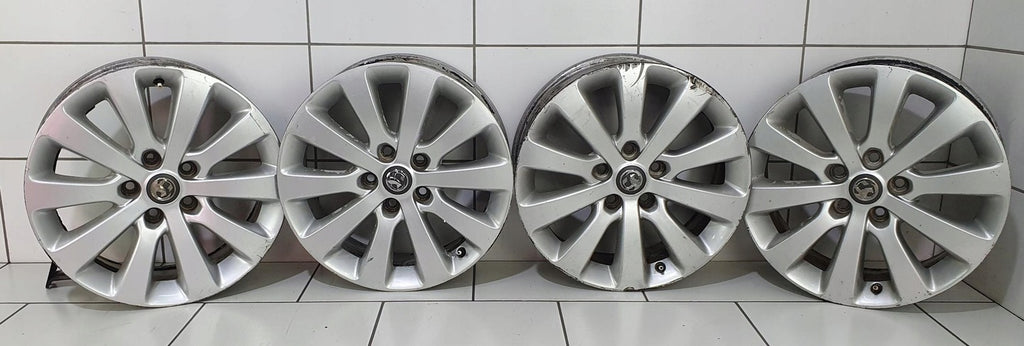 4x Alufelge 17 Zoll 7.0" 5x115 44ET Silber 13276347 Opel Astra J Rim Wheel