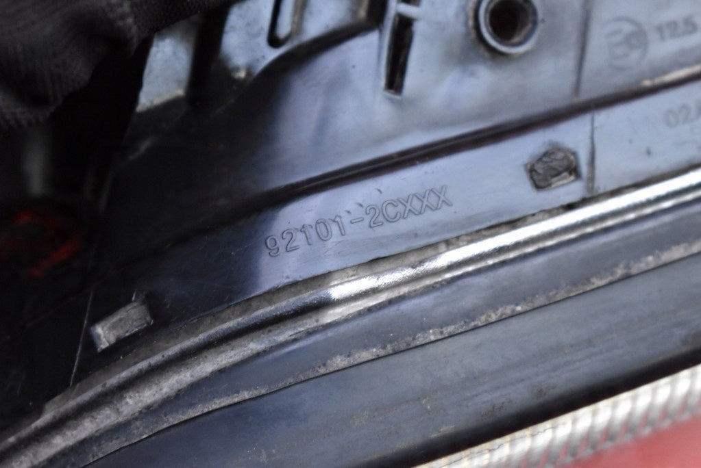 Frontscheinwerfer Hyundai Coupe 921012CXXX Links Scheinwerfer Headlight