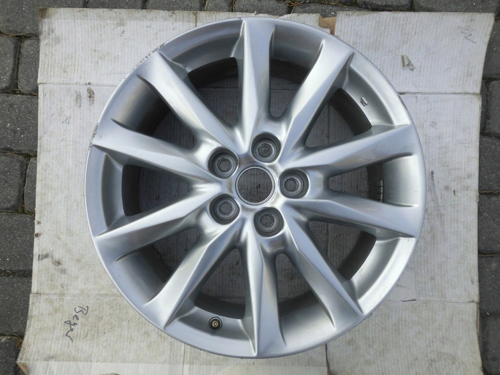 1x Alufelge 18 Zoll 7.0" 5x114.3 50ET Glanz Graphit 9965337080 Mazda Iii