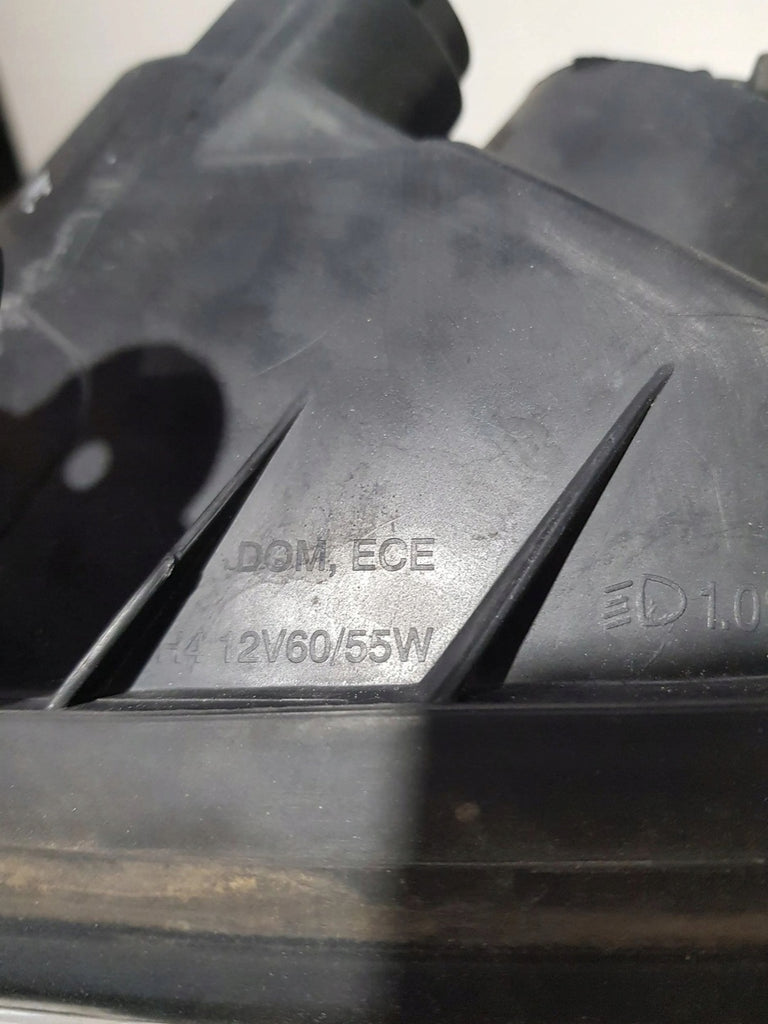 Frontscheinwerfer Kia Carens I Links Scheinwerfer Headlight