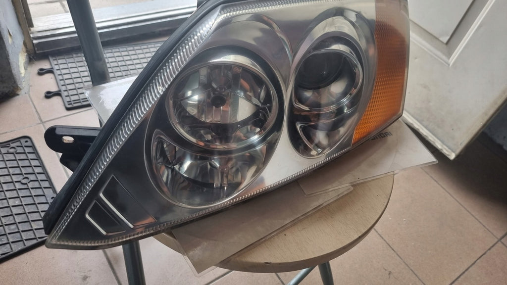 Frontscheinwerfer Hyundai II Coupe Links Scheinwerfer Headlight