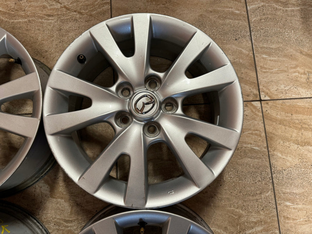 4x Alufelge 16 Zoll 6.5" 5x114.3 52 5ET Glanz Silber 8K996 Mazda I Rim Wheel FEL8689776965lg