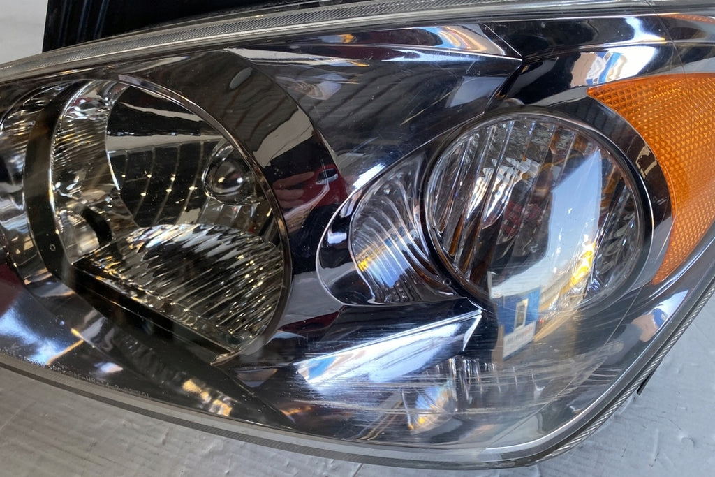 Frontscheinwerfer Kia Cerato 921012F0 Links Scheinwerfer Headlight